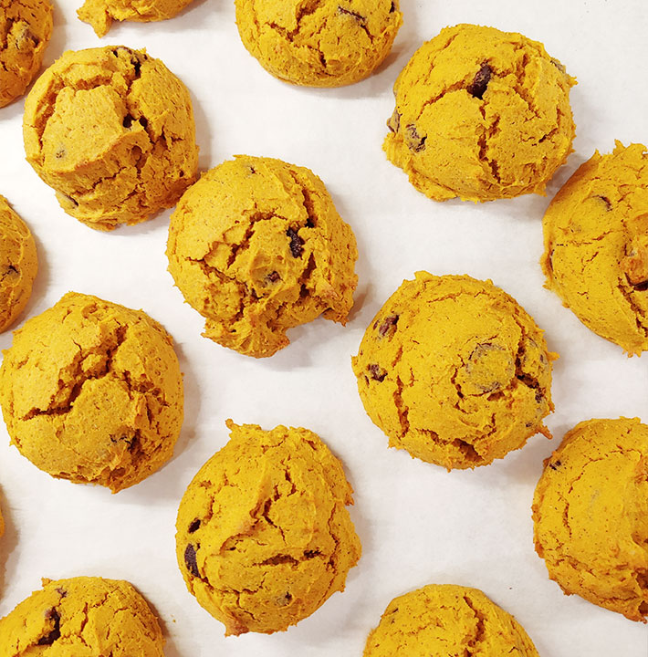 Baking sheet with pumpkin chocolate chip cookies